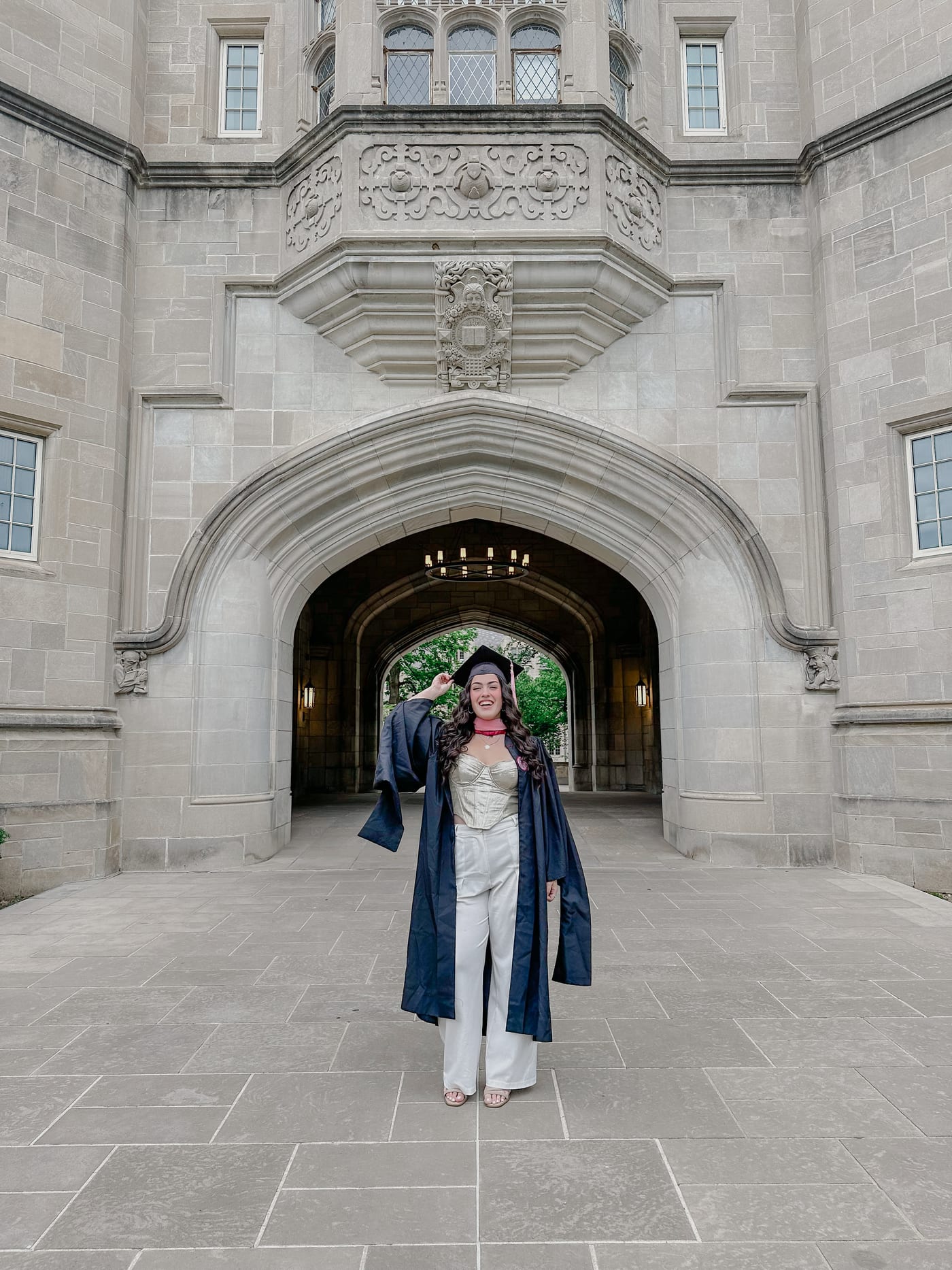 Dana in cap and gown at Indiana University