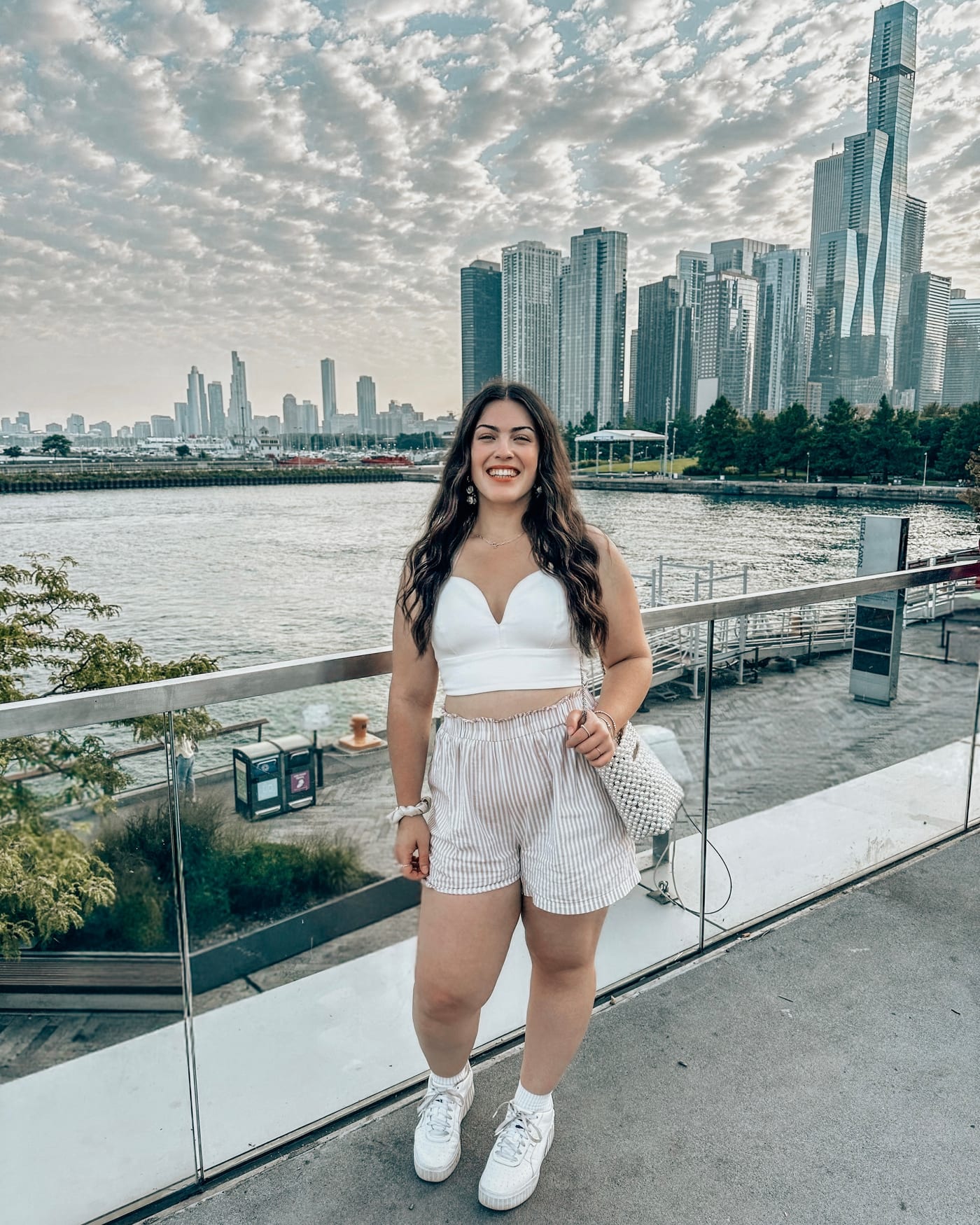 Dana with the Chicago skyline behind her